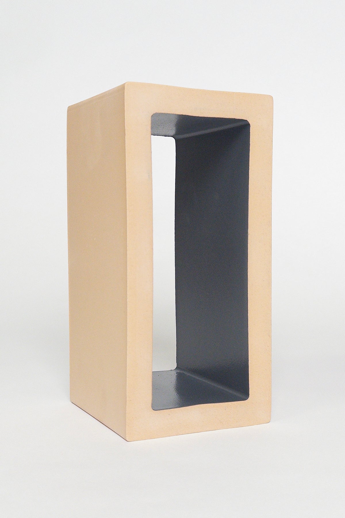 Breezy Black 4x8x4 ceramic breeze block with a matte black interior and natural clay exterior