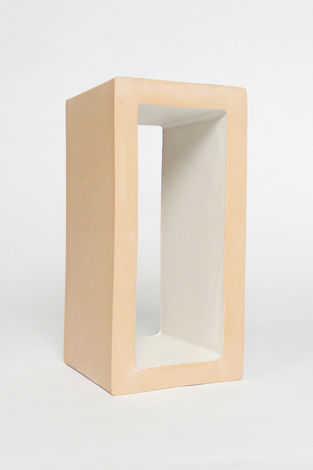 Breezy Chalk 4x8x4 ceramic breeze block with a matte white interior and natural clay exterior
