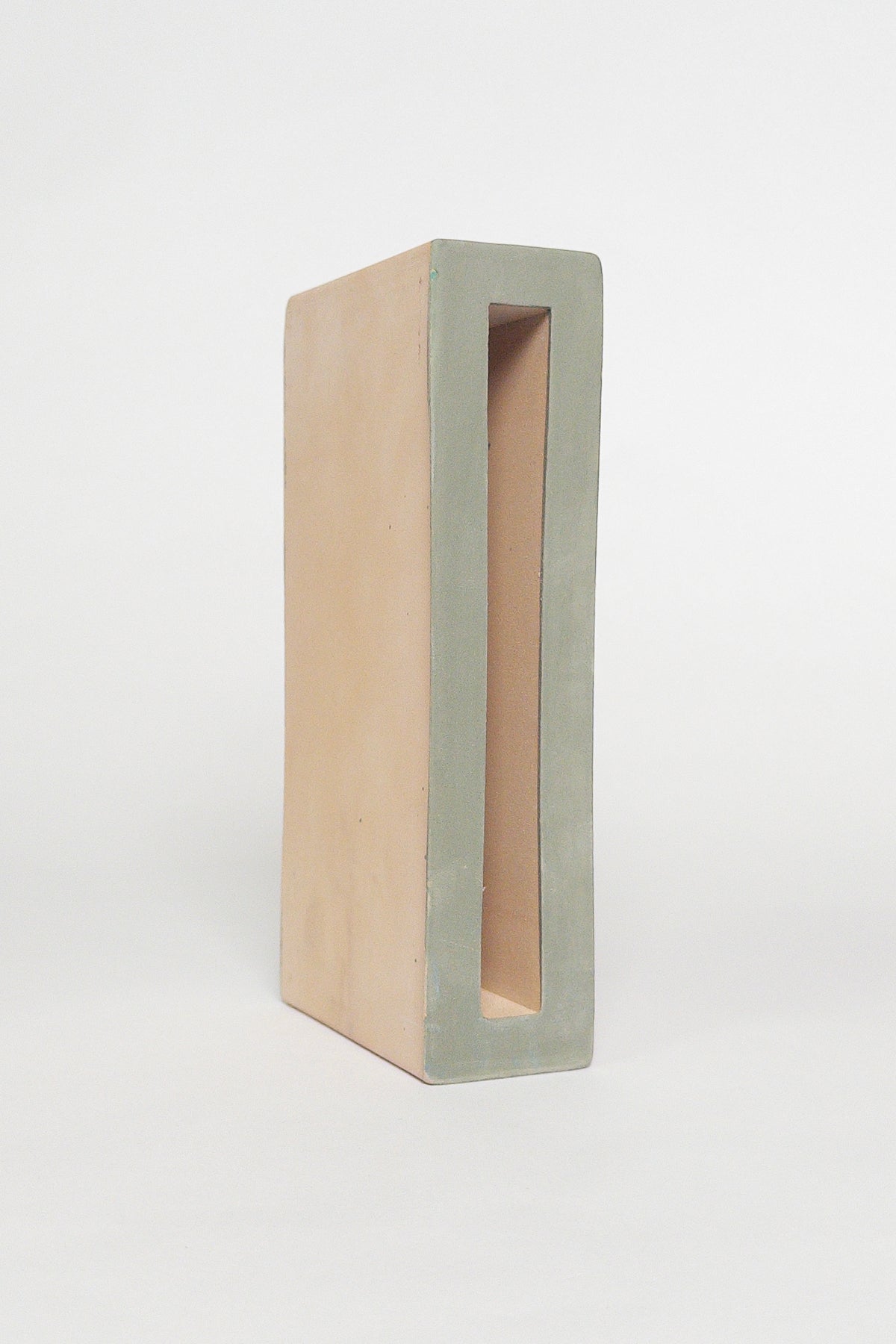Breezy Dark Green 2x8x4 slim ceramic breeze block with a matte green interior and natural clay exterior