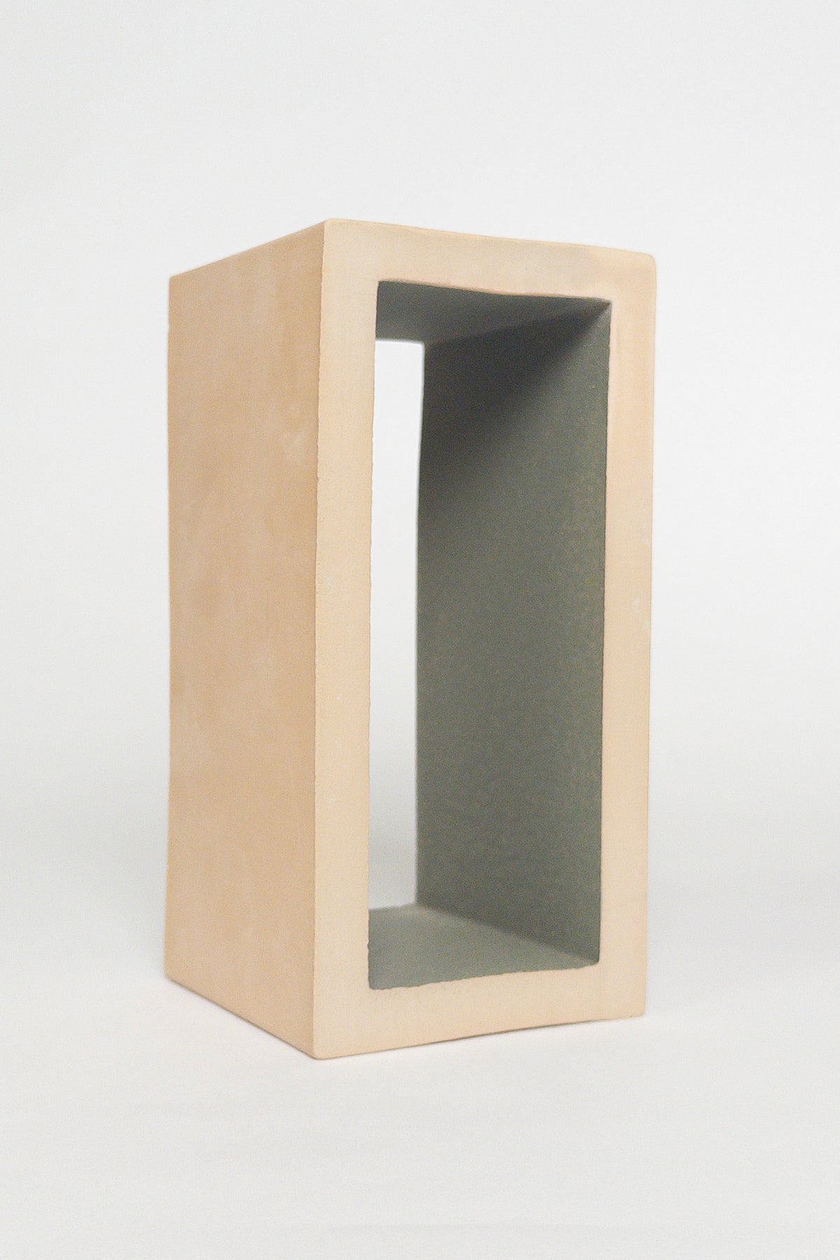 Breezy Dark Green 4x8x4 ceramic breeze block with a matte green interior and natural clay exterior