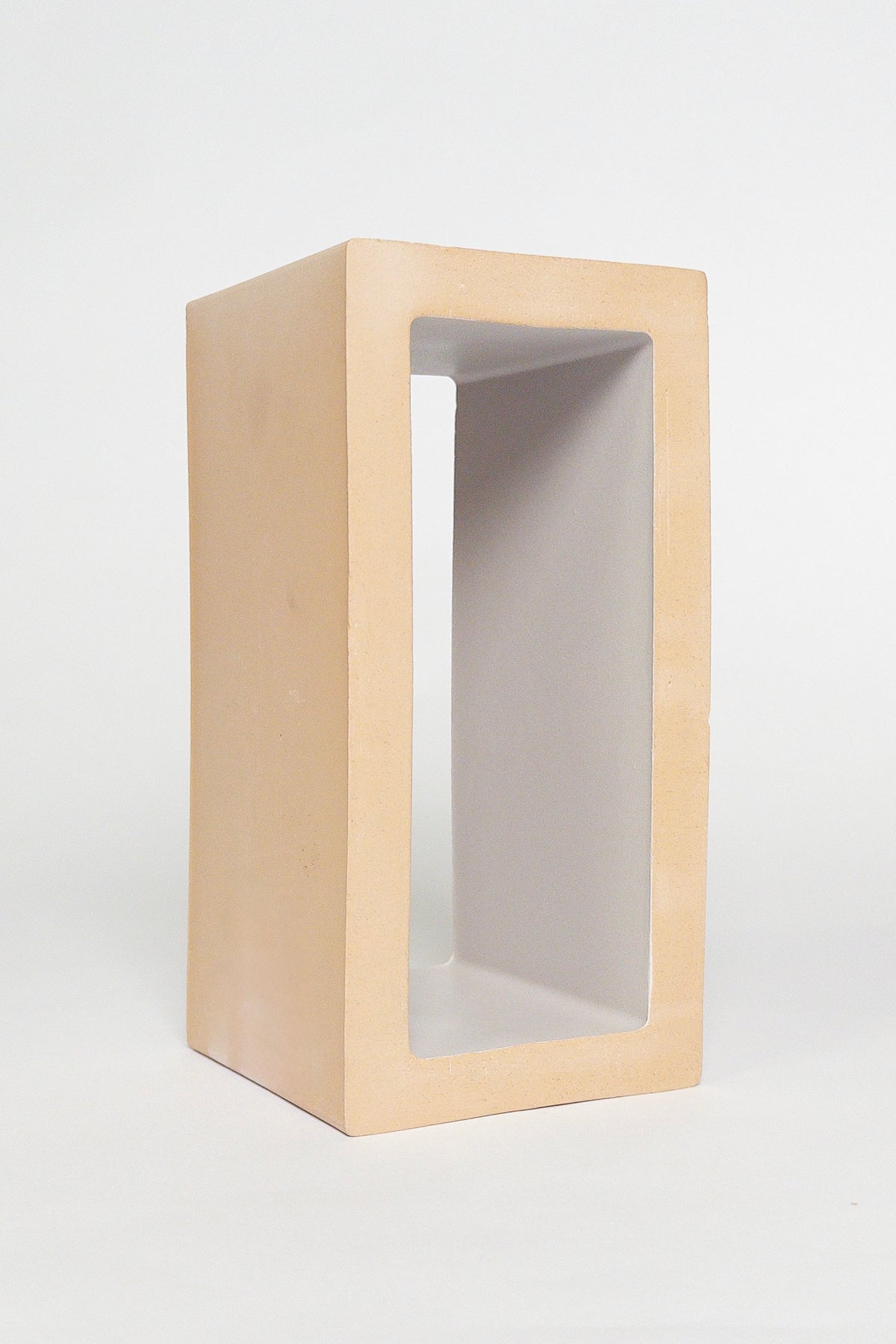 Breezy Grey 4x8x4 ceramic breeze block with a matte grey interior and natural clay exterior