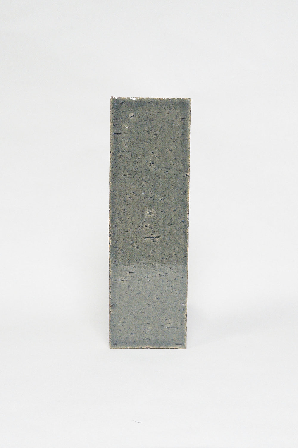 Artisan Green Copper green grey thin brick tile with a glossy glaze and subtle texture