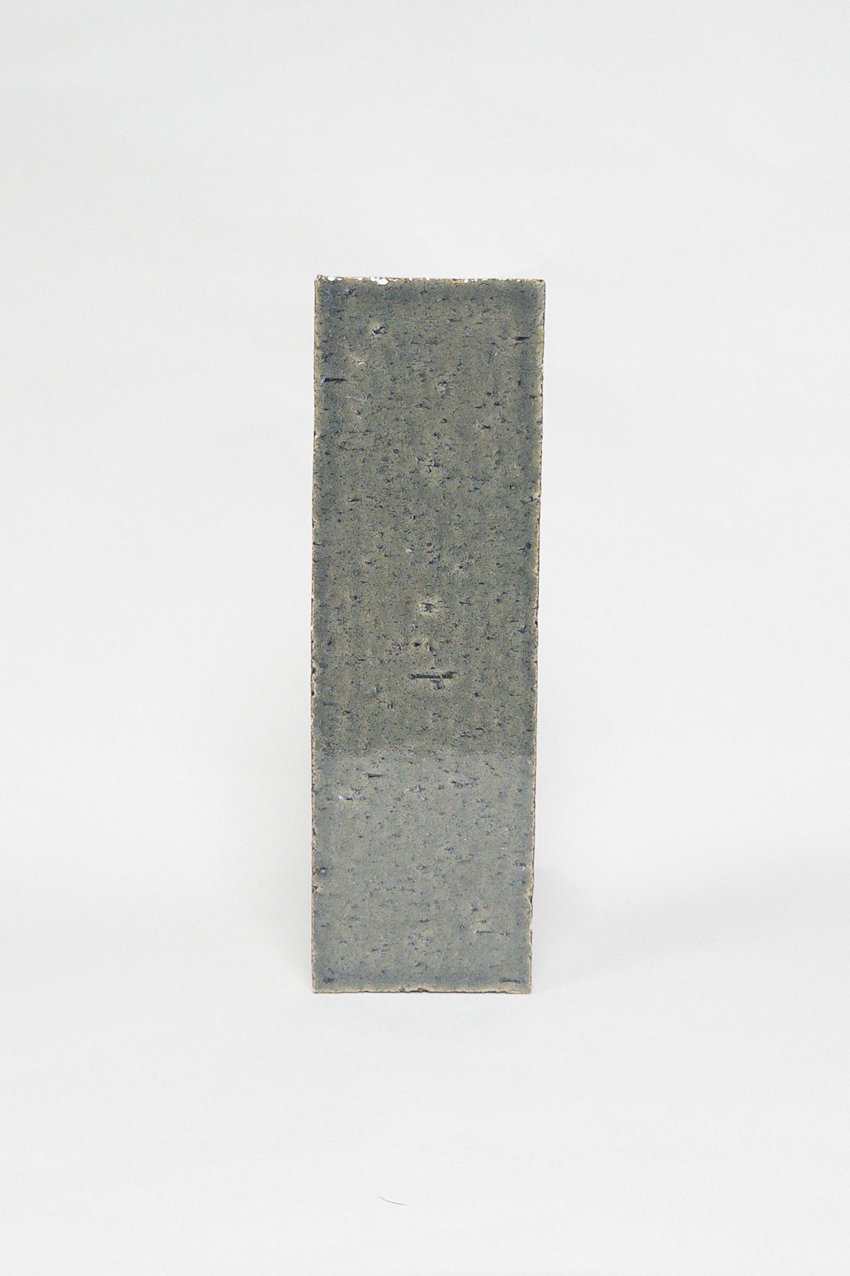 Artisan Green Copper green grey thin brick tile with a glossy glaze and subtle texture