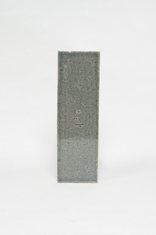 Artisan Green Copper green grey thin brick tile with a glossy glaze and subtle texture