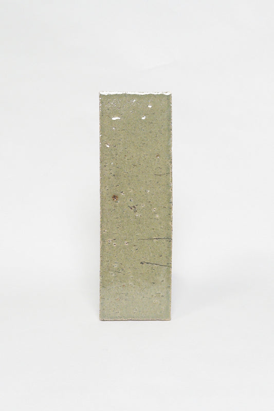 Artisan Moss green thin brick tile with a glossy glaze and earthy olive undertones