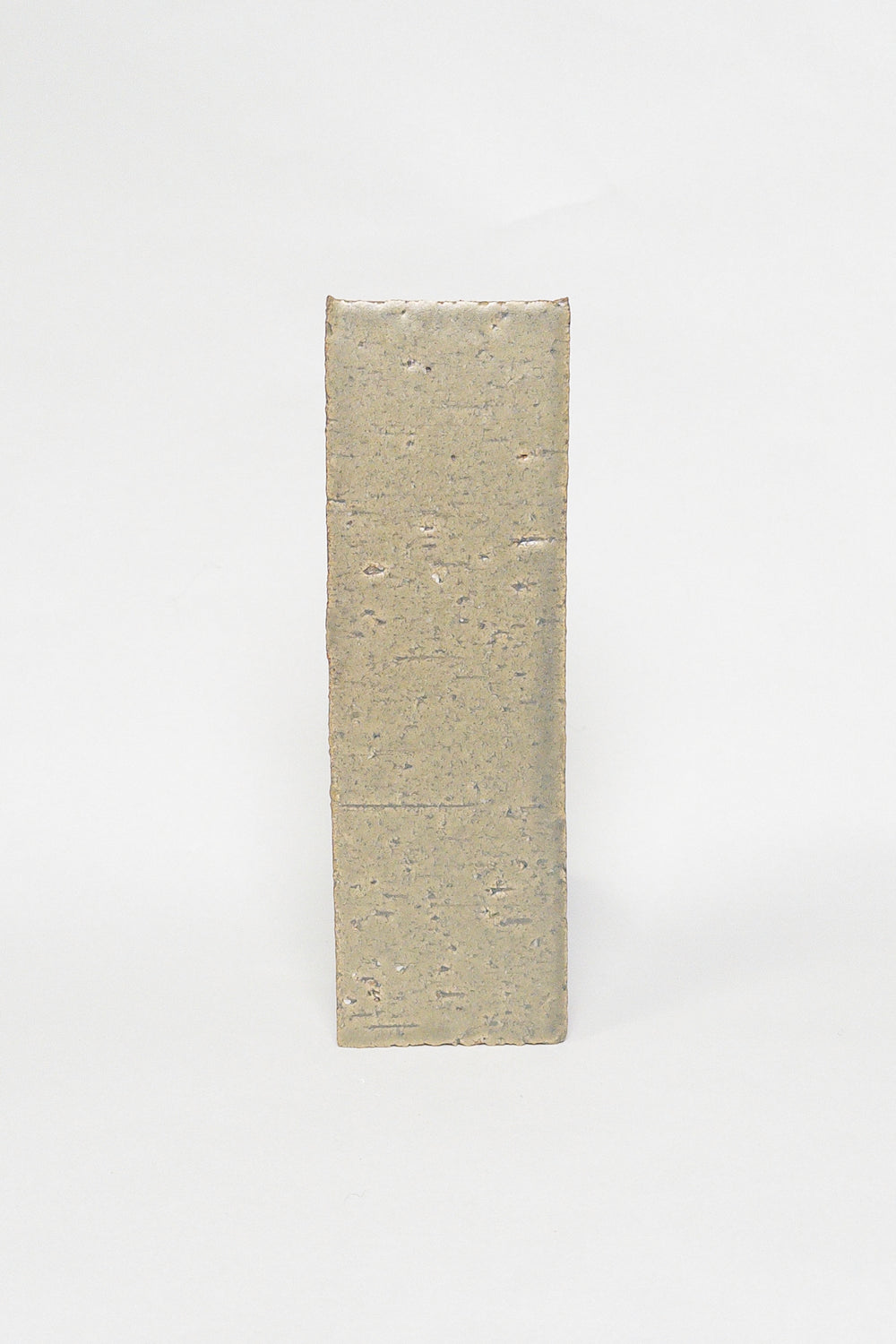 Artisan Rosemary taupe thin brick tile with a matte glaze and earthy surface texture
