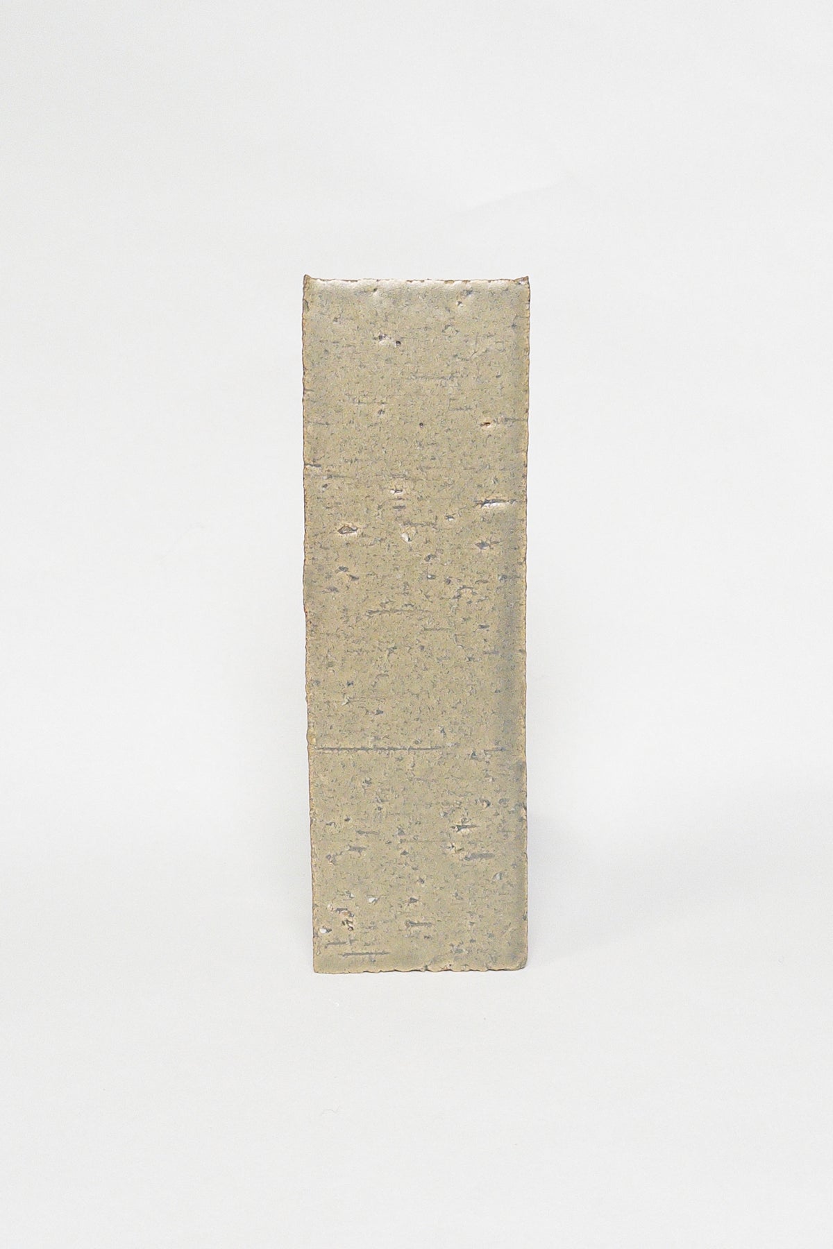 Artisan Rosemary taupe thin brick tile with a matte glaze and earthy surface texture
