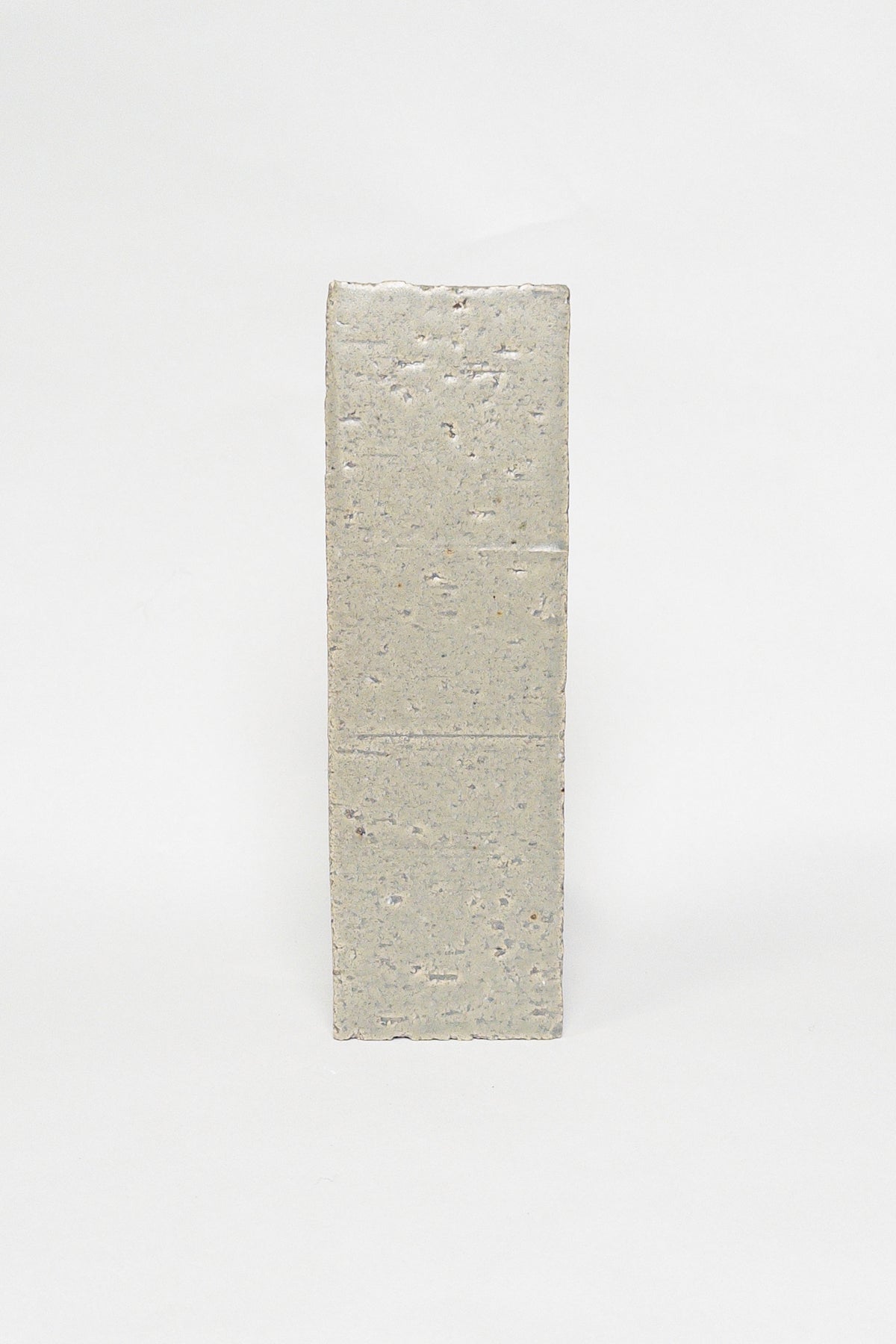 Artisan Stone Grey thin brick tile with a matte glaze and subtly uneven surface