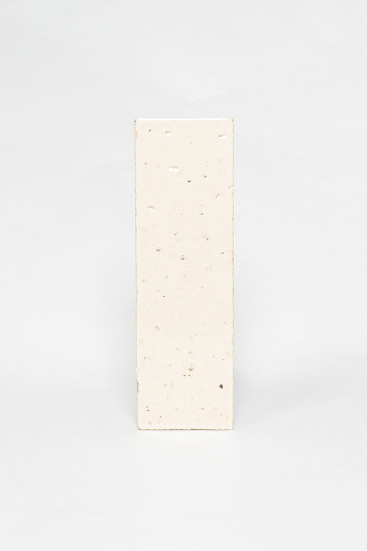 Artisan Sunkissed cream thin brick tile with a glossy glaze and fine speckles