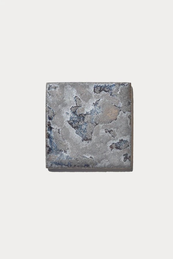 Ember CRATER Piedras 72 tile sample on off-white background
