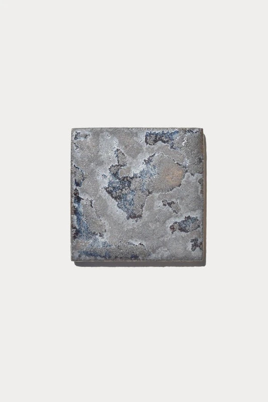 Ember CRATER Piedras 72 tile sample on off-white background
