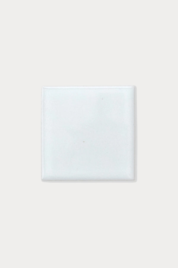 Summit GLACIER Polar Gloss tile sample on off-white background
