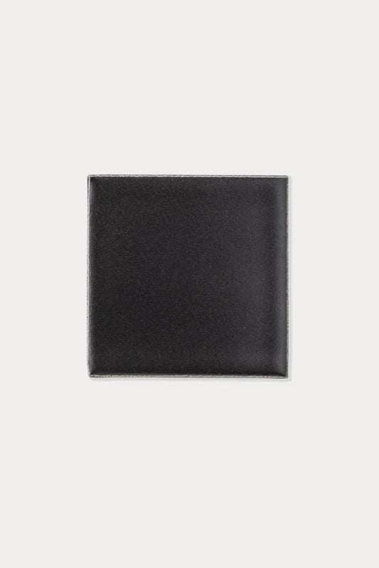 Summit VOLCANO Waxy Black Matte tile sample on off-white background