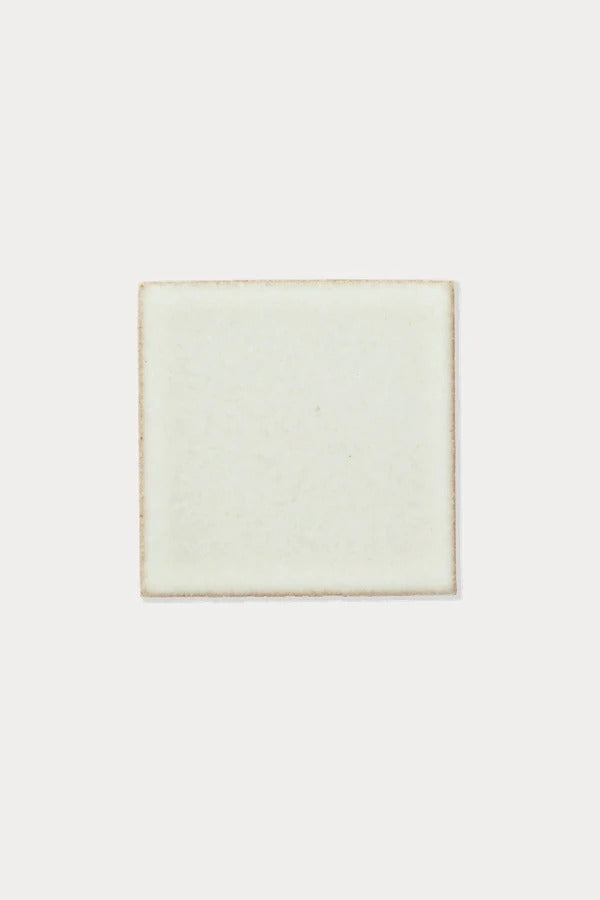 Summit WHITE SANDS Buff Matte tile sample on off-white background
